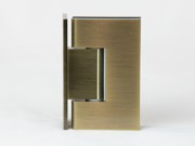 Variable angle glass to wall hinge in Antique Brass