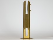 Core drilled square pool fence spigot in brushed gold
