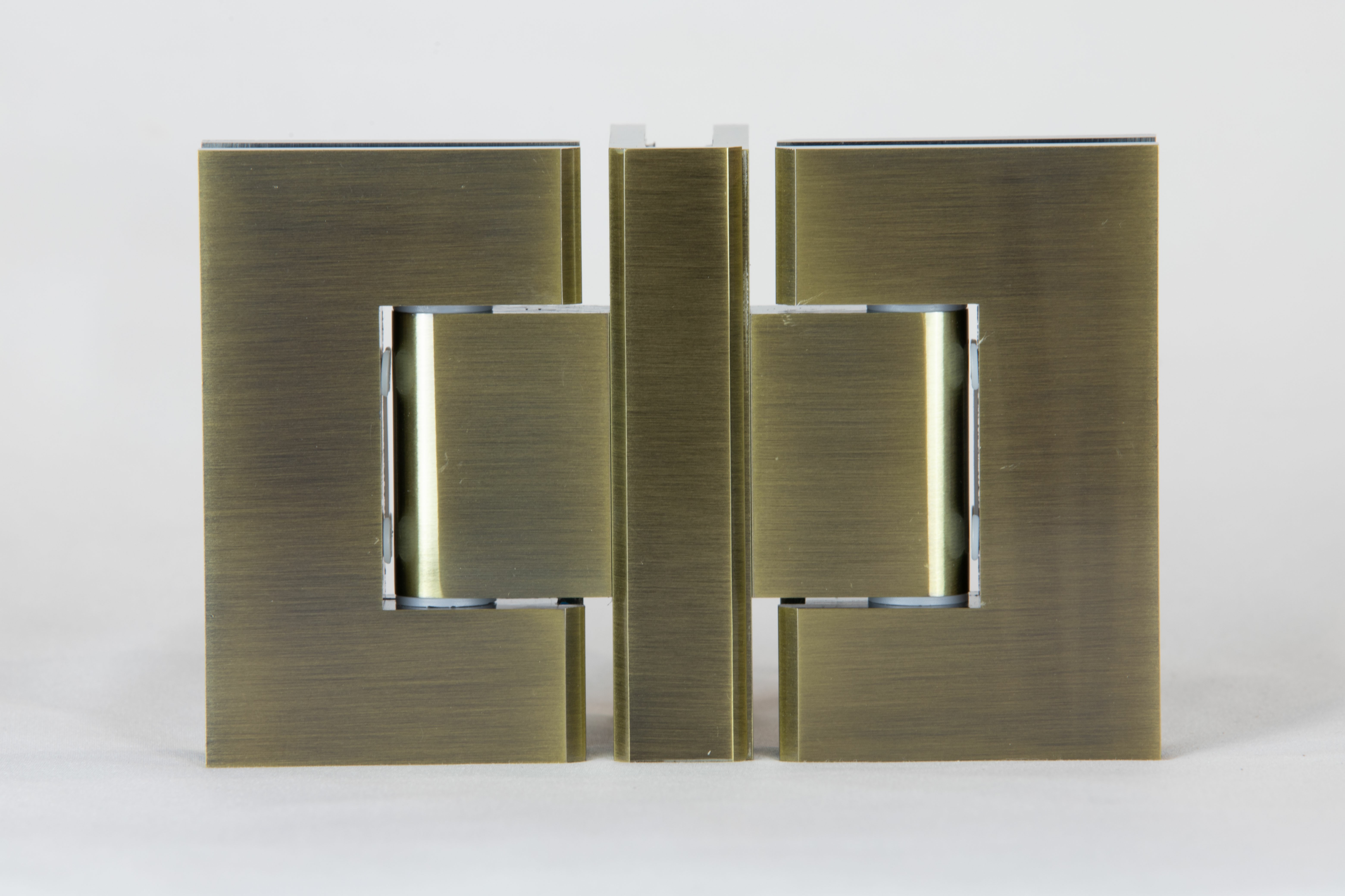 Antique brass shower hinge that is back to back glass connector