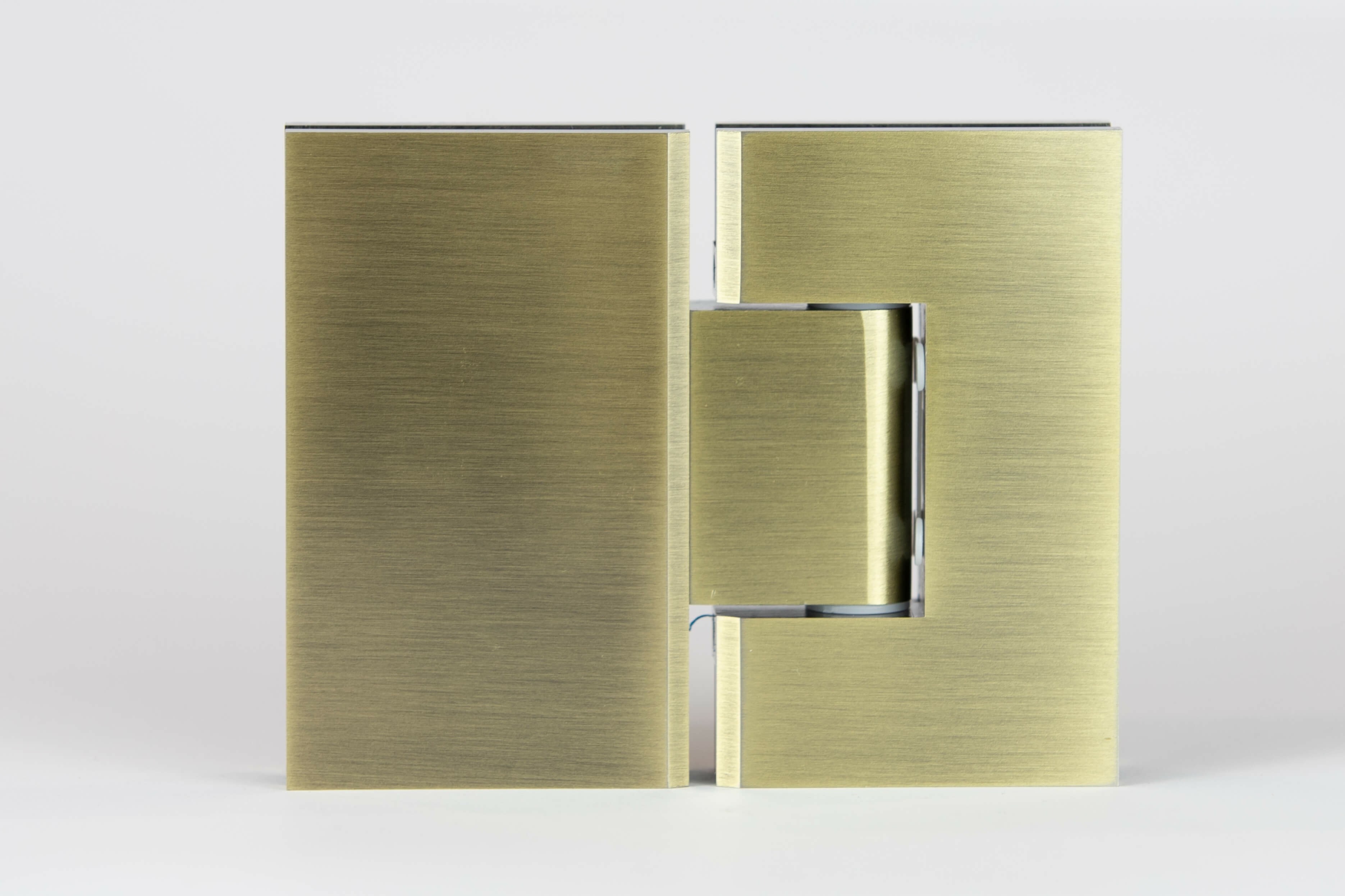 ES2 AB - 180 degree glass to glass shower hinge in an antique brass finish