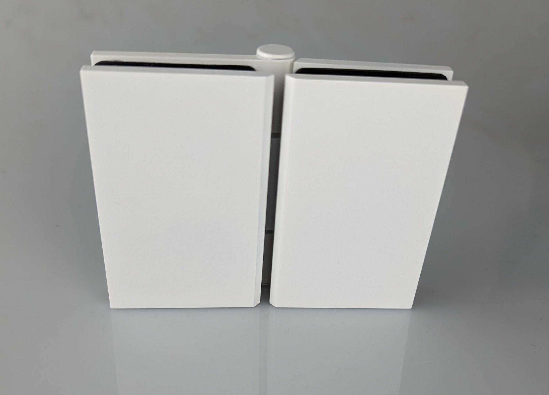 Matt White bifold hinge for glass to glass shower installation