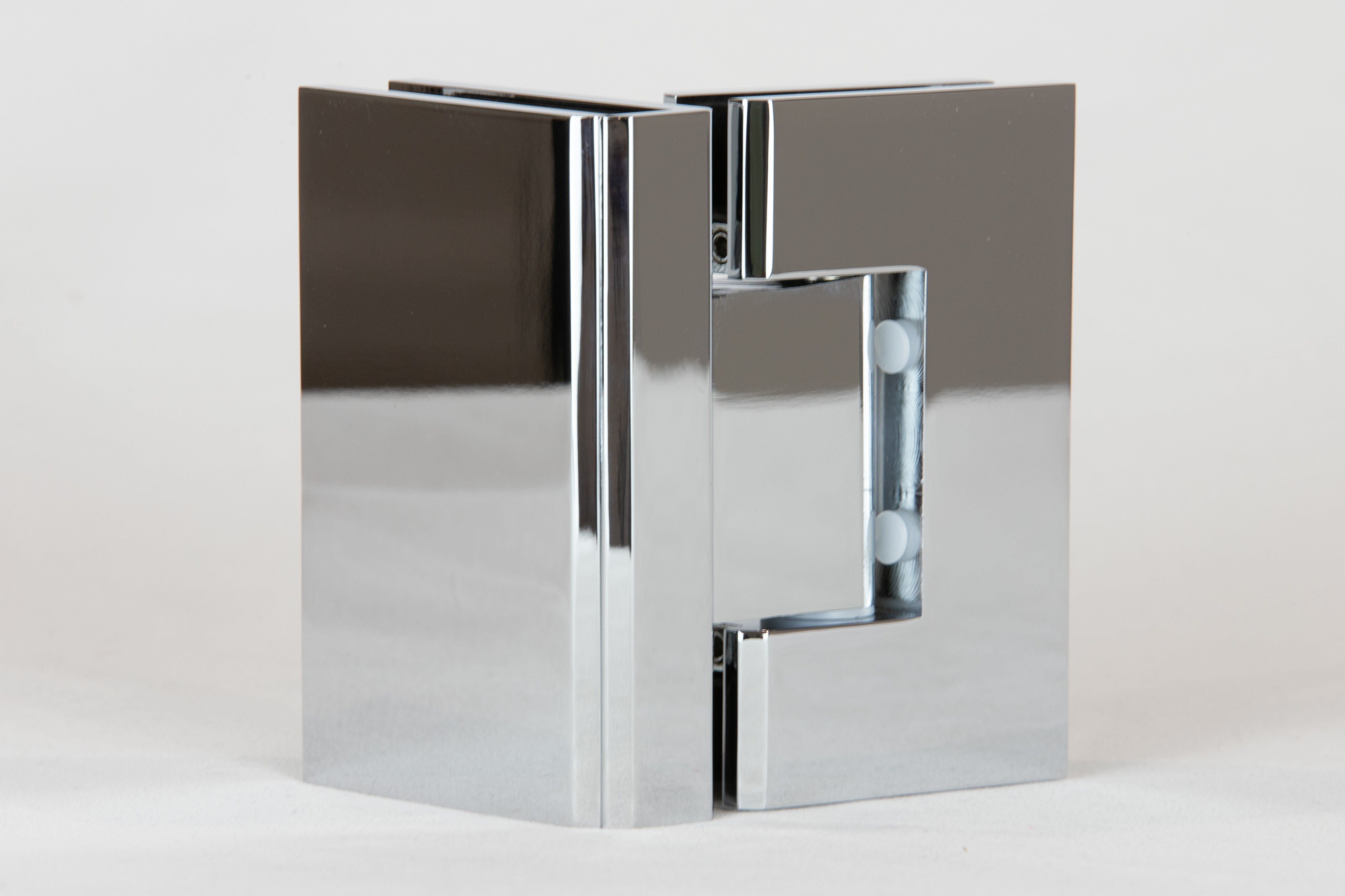 Polished chrome shower hinge for use in glass to glass fixing applications